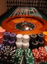 Mobile phone displaying Starburst slot game on taiwan result with spinning reels and win highlight